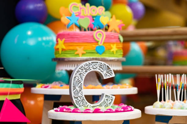 Celebrate Big Moments with a Colourful Monogram Baby Shark Cake